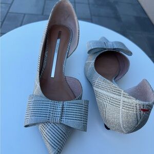 Staccato Gray Plaid Heels with Bow
Cow skin sole
Original price $200